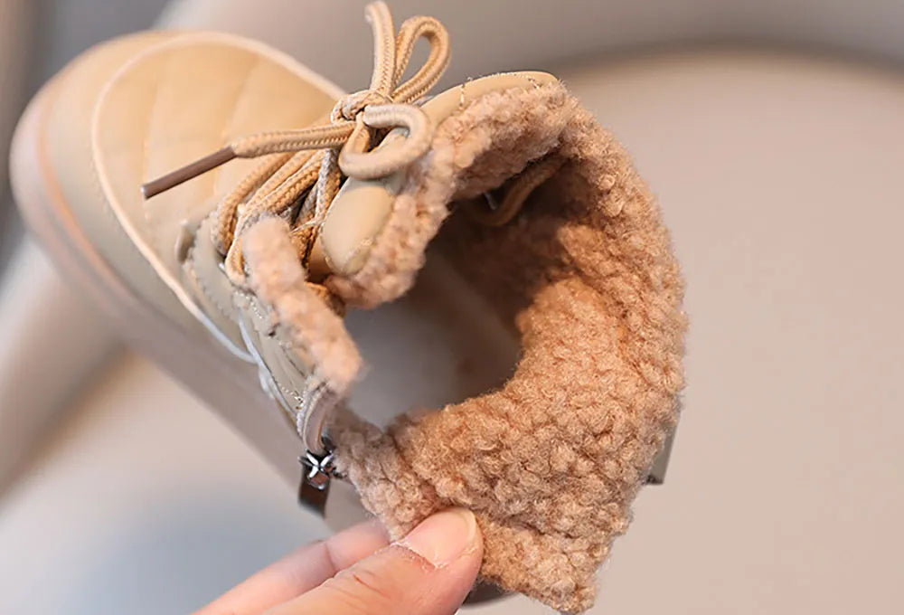 Children snow boots in sequins